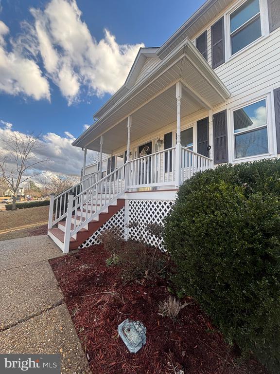 exterior space featuring covered porch