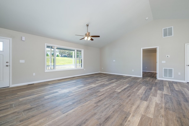 unfurnished living room with baseboards, a ceiling fan, wood finished floors, and visible vents