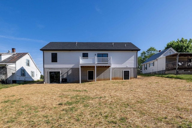 back of house featuring a wooden deck, a yard, and cooling unit