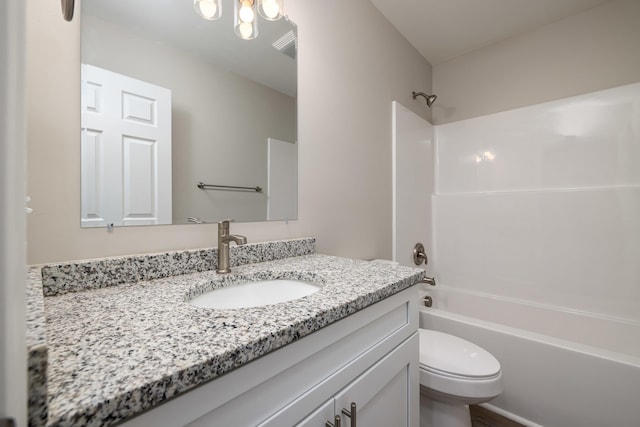 full bath with shower / bathtub combination, toilet, and vanity