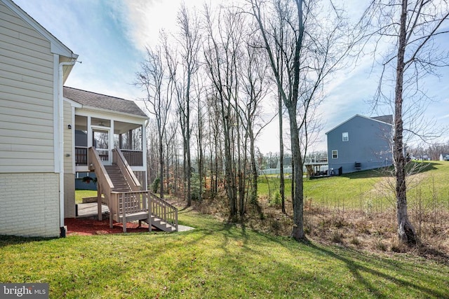 view of yard featuring stairway