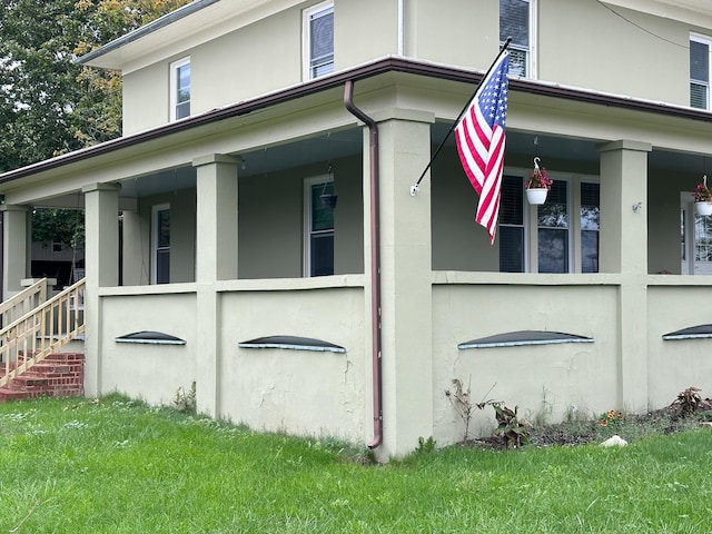 view of home's exterior with a porch