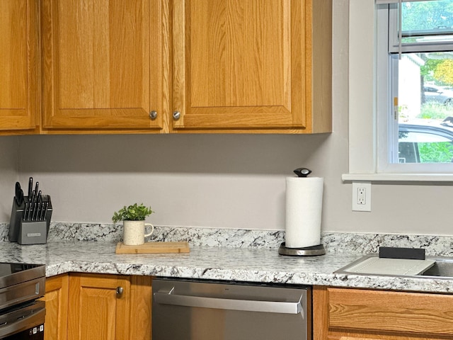 kitchen with dishwasher and stove