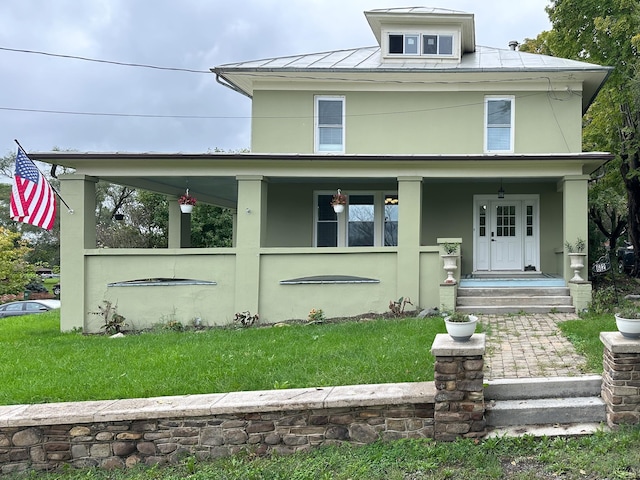 view of front facade featuring a front lawn