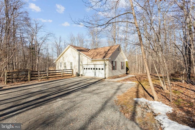 view of property exterior featuring a garage