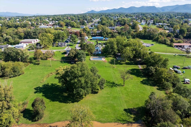 birds eye view of property featuring a mountain view