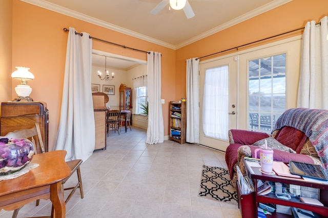 living area featuring crown molding, ceiling fan with notable chandelier, light tile patterned flooring, and french doors