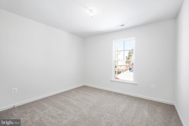 view of carpeted spare room