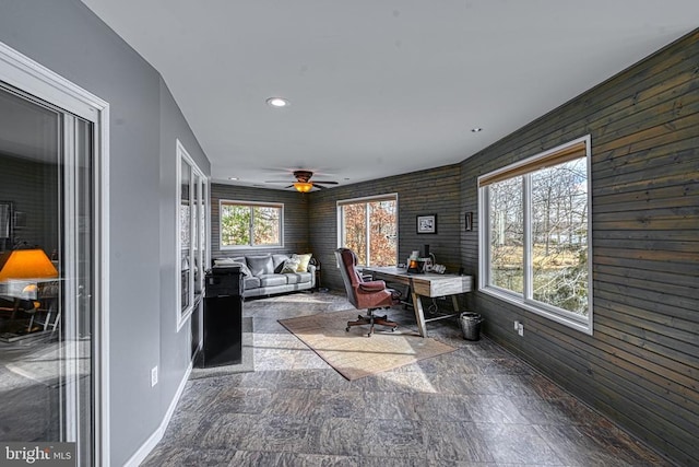 office space featuring ceiling fan, wooden walls, and recessed lighting