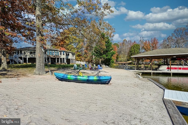 surrounding community featuring a water view