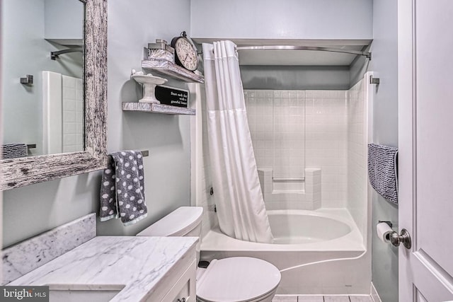 bathroom with toilet, shower / bath combo with shower curtain, and vanity