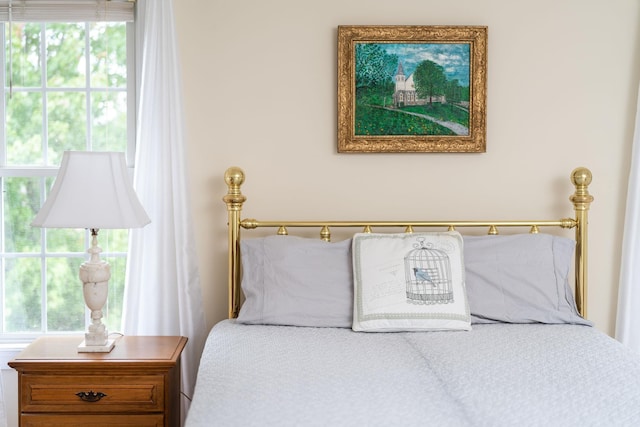 bedroom featuring multiple windows