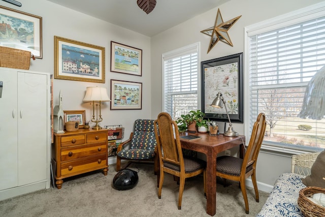 view of carpeted dining space