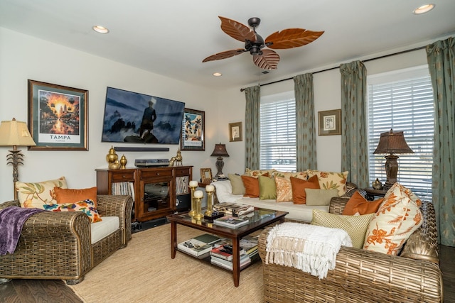 living room with a wealth of natural light, recessed lighting, and ceiling fan
