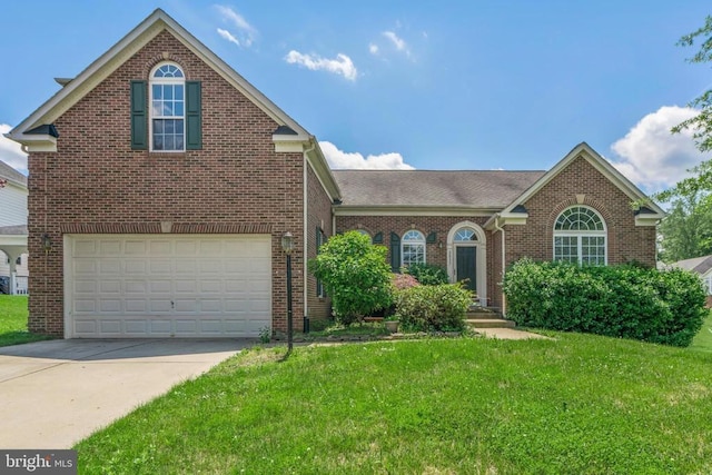 front facade with a garage and a front lawn