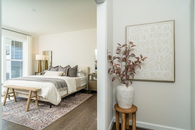 bedroom featuring dark hardwood / wood-style floors