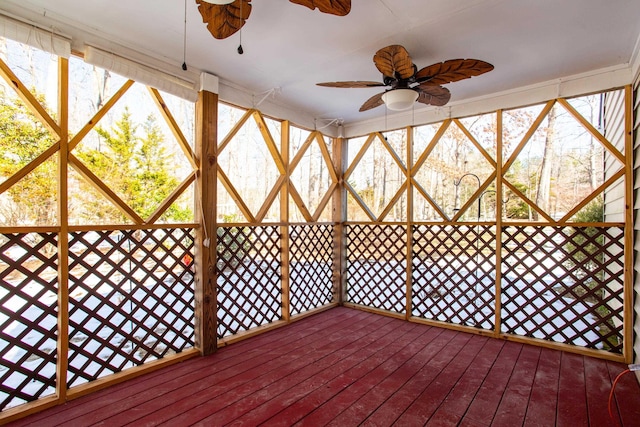 wooden terrace featuring ceiling fan