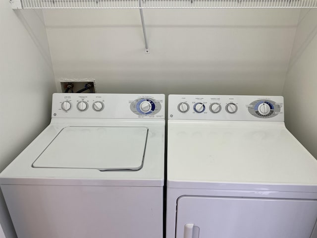 laundry room with washer and dryer