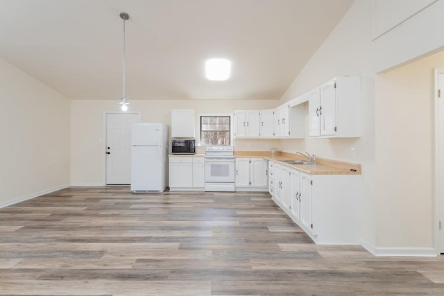 kitchen featuring sink, white cabinetry, hanging light fixtures, white appliances, and light hardwood / wood-style floors