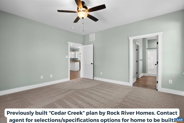 unfurnished bedroom featuring ceiling fan, ensuite bath, and carpet flooring