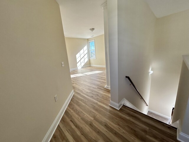 hallway featuring hardwood / wood-style floors