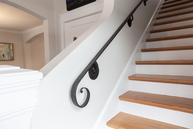 stairway with crown molding