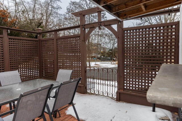 view of snow covered patio