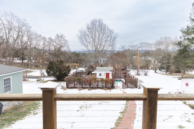 view of snow covered deck