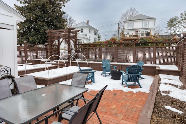 view of snow covered patio