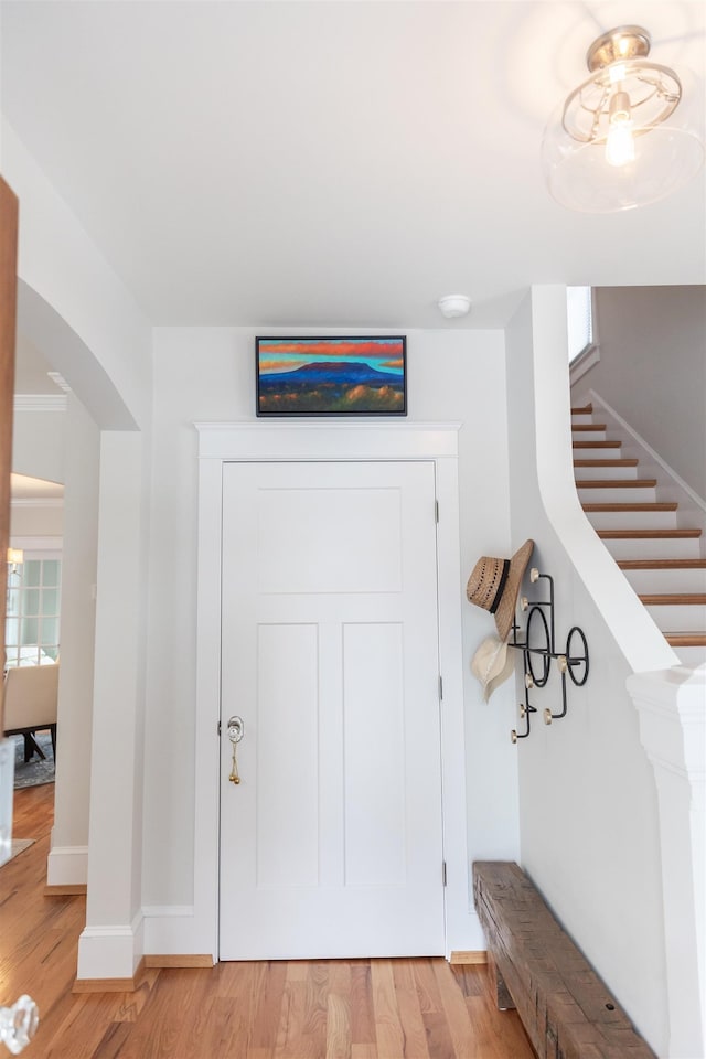 entrance foyer with light hardwood / wood-style flooring