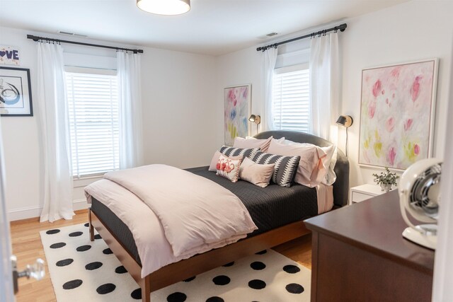 bedroom featuring light hardwood / wood-style flooring