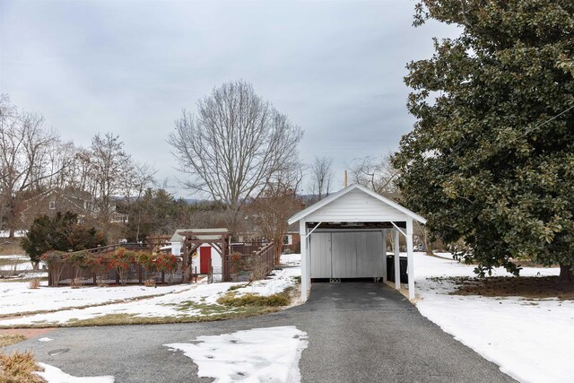 view of front of home with a carport