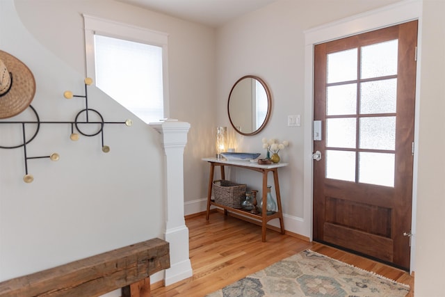 entryway with light hardwood / wood-style flooring