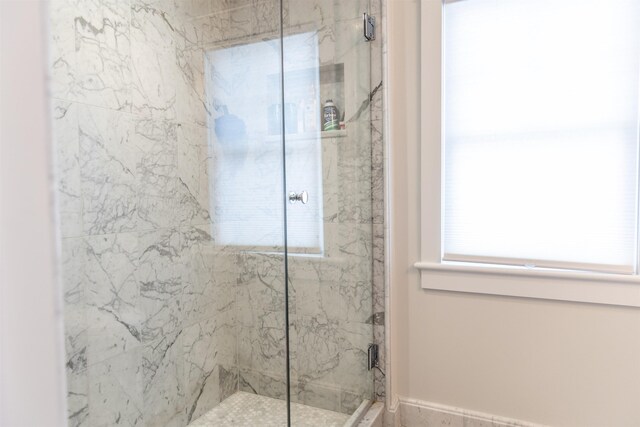 bathroom featuring walk in shower