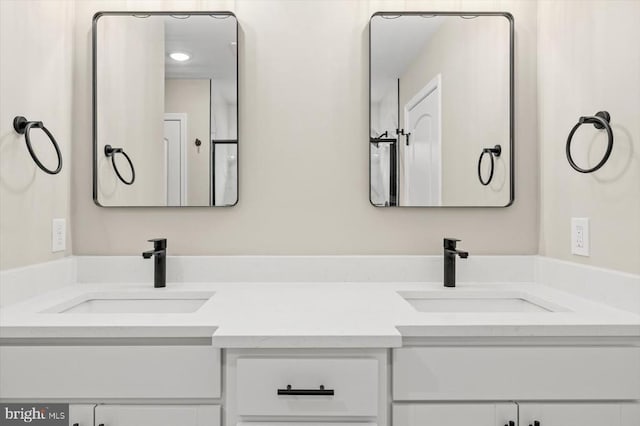 bathroom with double vanity