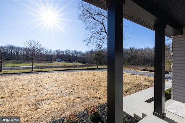 view of patio with a water view