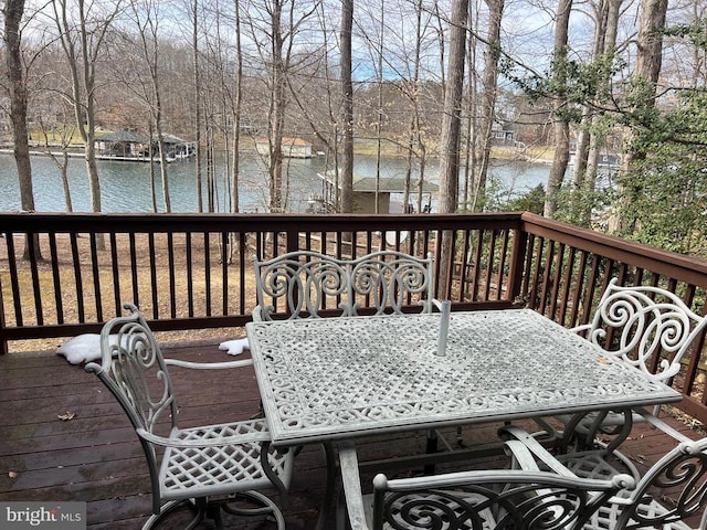 deck featuring a water view