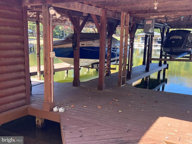 view of dock featuring boat lift