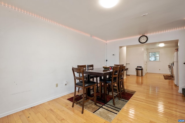 1122 Preston Ave Unit A-B, Charlottesville, VA 22903 - dining space with light wood-style flooring and baseboards
