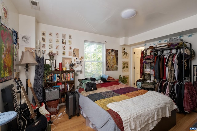1122 Preston Ave Unit A-B, Charlottesville, VA 22903 - bedroom with wood finished floors and a closet