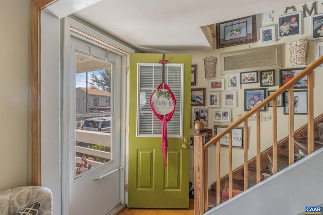foyer featuring stairs