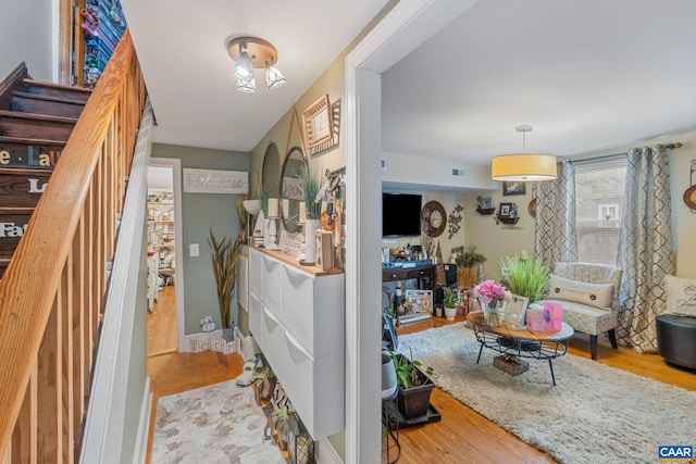 325 10 1/2 St NW, Charlottesville, VA 22903 - entryway featuring wood finished floors and stairs