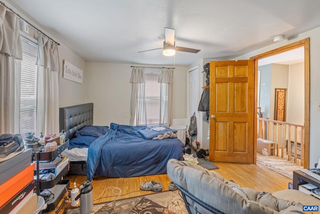 325 10 1/2 St NW, Charlottesville, VA 22903 - bedroom with wood finished floors and ceiling fan