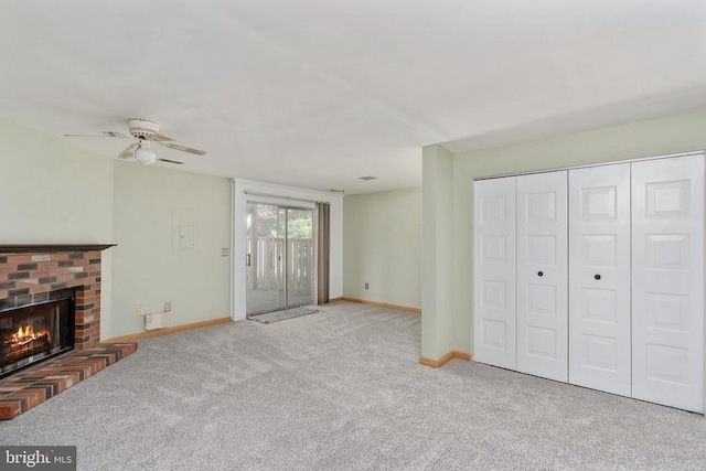 10718 Brice Ct, Fredericksburg, VA 22407 - unfurnished living room featuring carpet floors, baseboards, a fireplace, and a ceiling fan