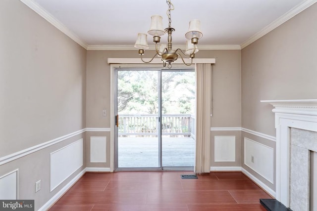 10718 Brice Ct, Fredericksburg, VA 22407 - unfurnished dining area featuring a chandelier, ornamental molding, and wood finished floors