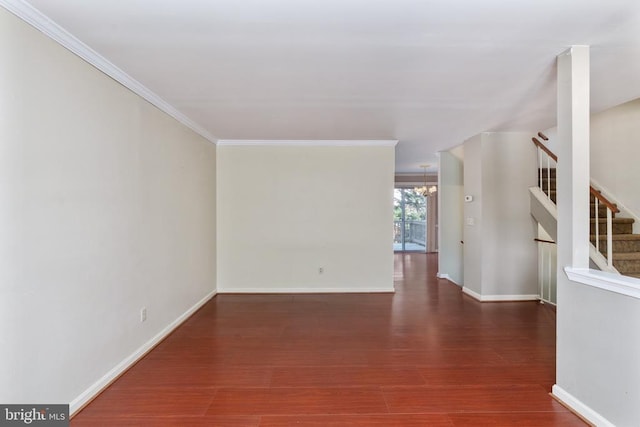 10718 Brice Ct, Fredericksburg, VA 22407 - unfurnished room with a chandelier, wood finished floors, ornamental molding, baseboards, and stairway