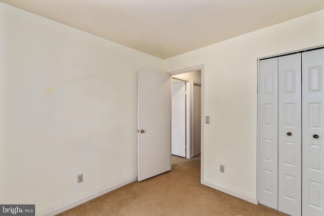 10718 Brice Ct, Fredericksburg, VA 22407 - unfurnished bedroom featuring light colored carpet, baseboards, and a closet