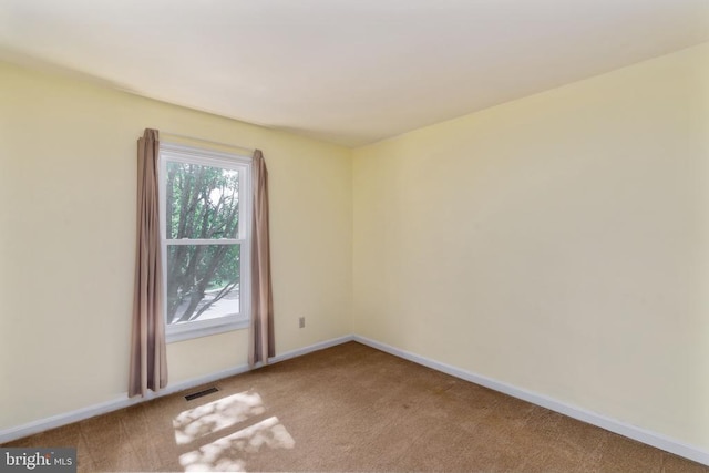10718 Brice Ct, Fredericksburg, VA 22407 - carpeted spare room with baseboards