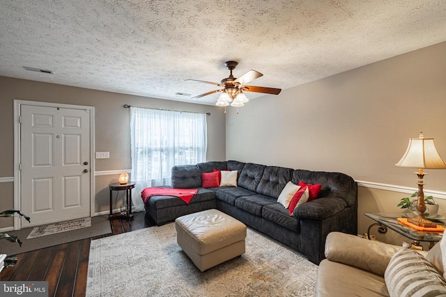9910 Warwick Pl, Fredericksburg, VA 22408 - living room with hardwood / wood-style flooring, a textured ceiling, ceiling fan, and baseboards