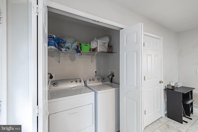 9910 Warwick Pl, Fredericksburg, VA 22408 - laundry room featuring separate washer and dryer and light tile patterned flooring